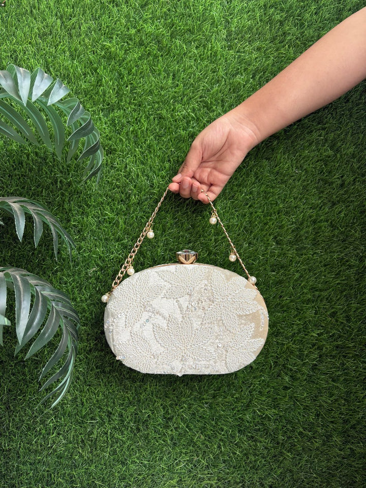 Floral Cutdaana Detailing Clutch by The Potli Ghar