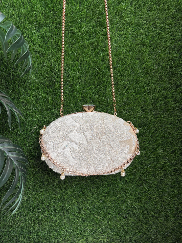 Elegant floral embellished clutch for festive and wedding outfits