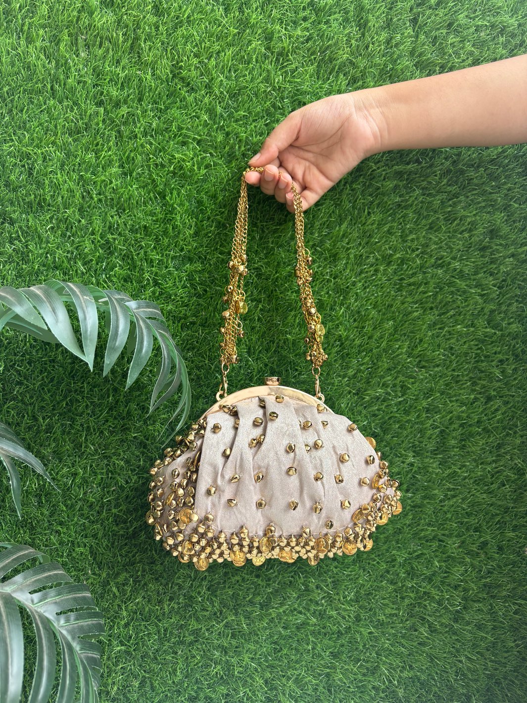 Designer potli clutch with ghungroo detailing