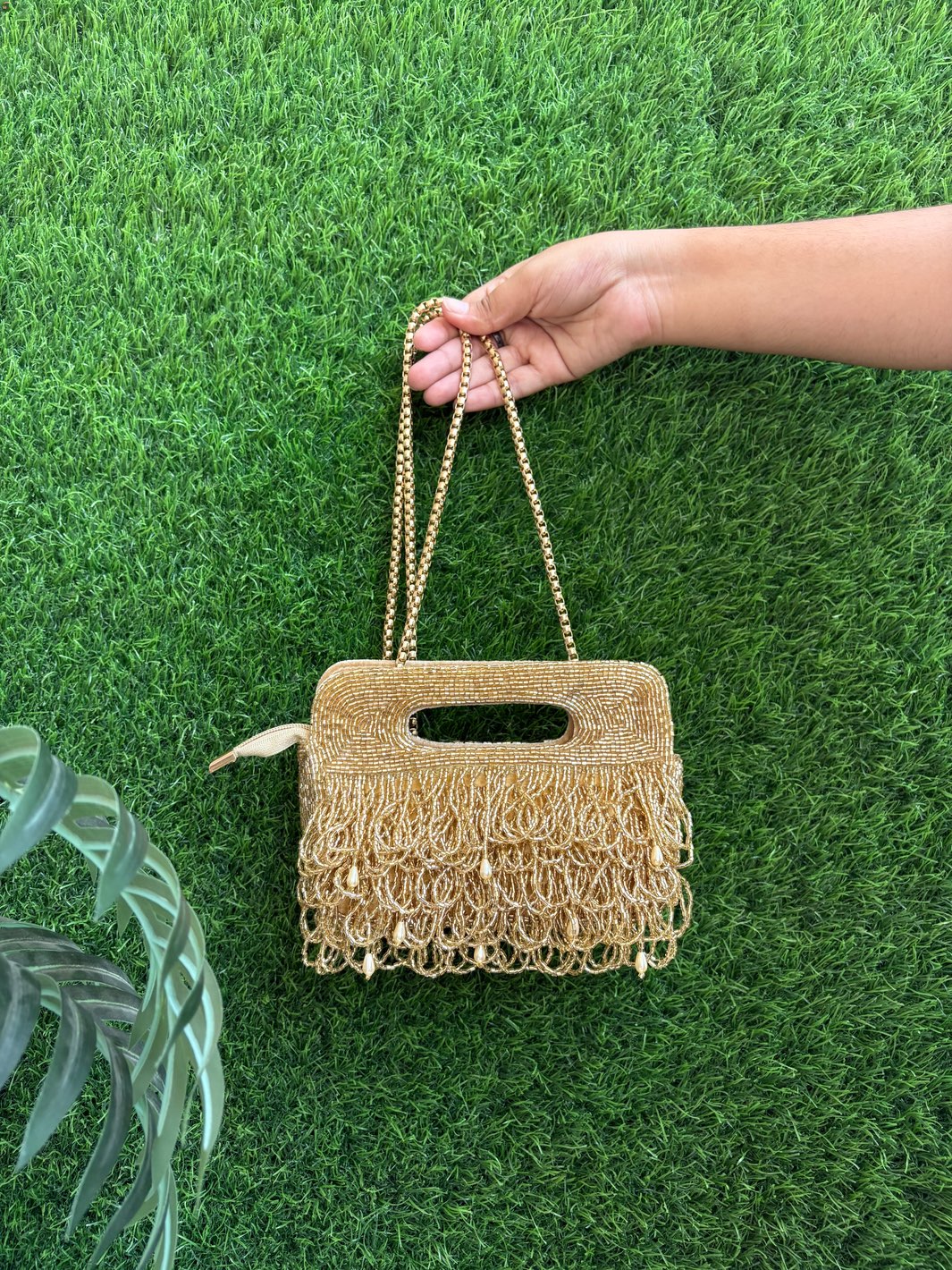 Designer ethnic clutch with sling chain
