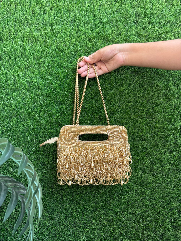Designer ethnic clutch with sling chain