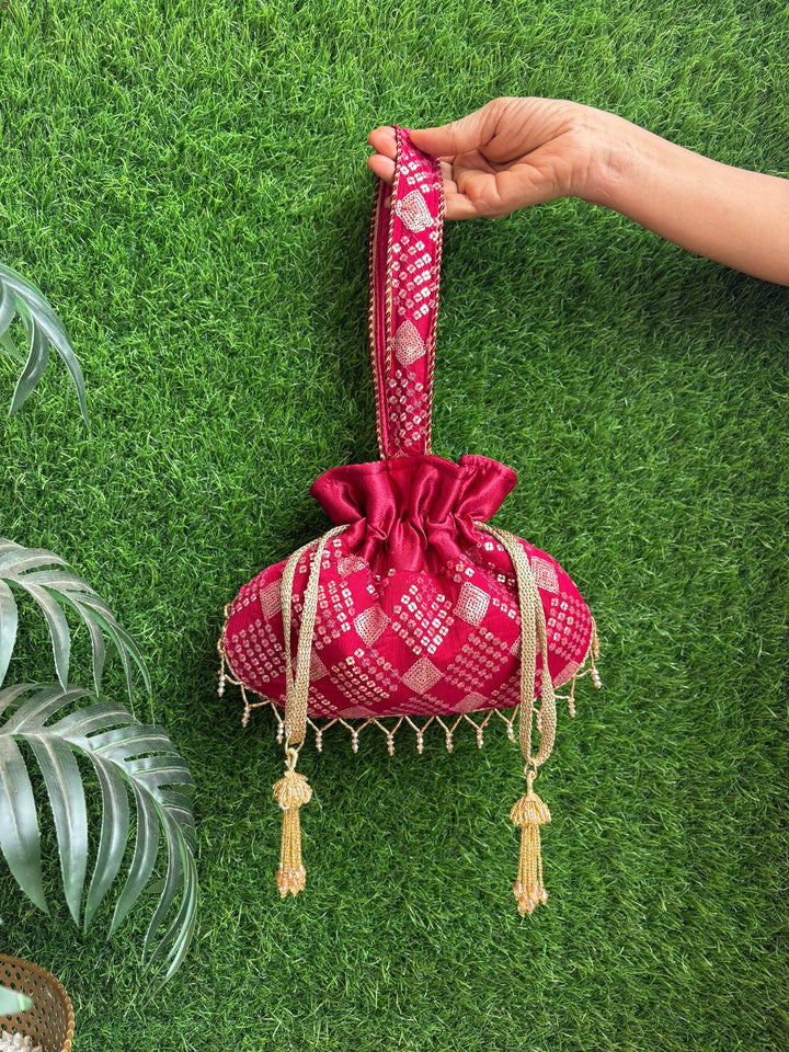 Dark red designer potli bag with elegant detailing