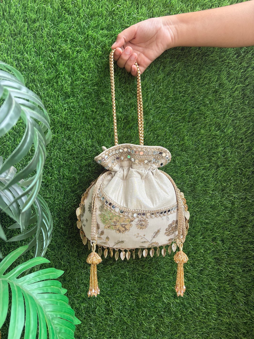 Minimal Floral Touch Potli Bag with Gold Embellishments