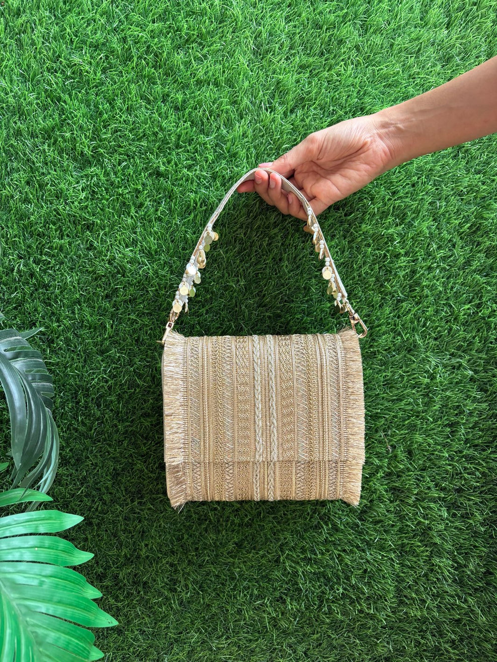Designer gold ethnic clutch with braided embroidery