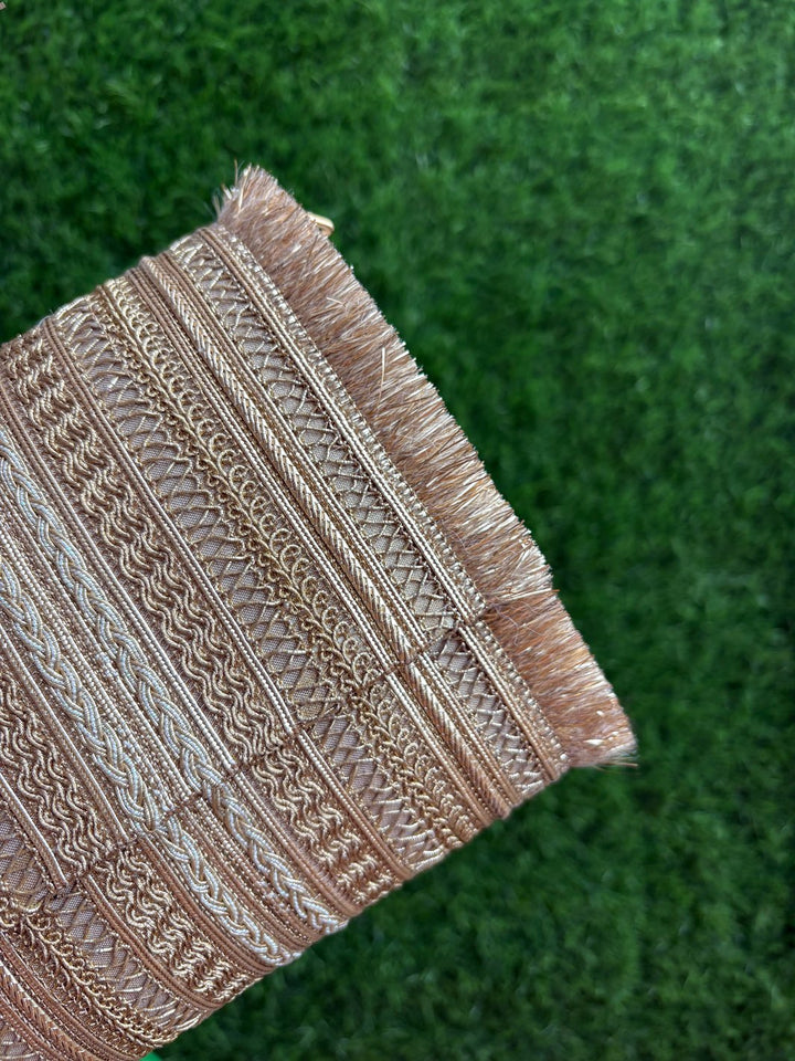 Premium Gold Ethnic Clutch Bag styled with a wedding outfit