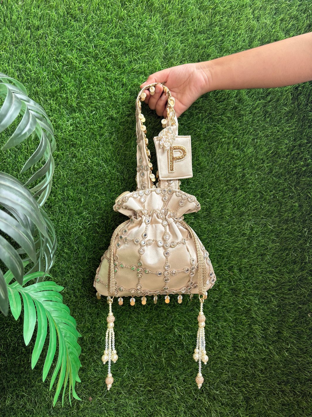 Royal Cutwork Gold Potli with Customised Initial Charm