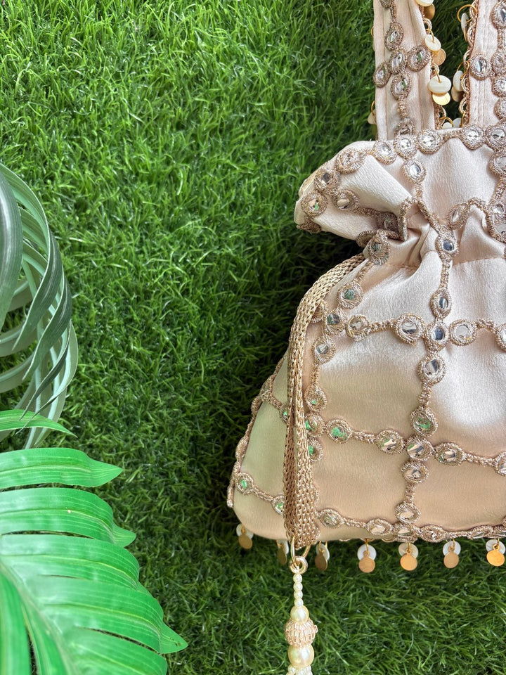 Cutwork Potli with Pearl Tassels