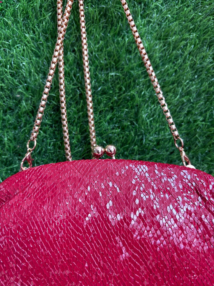 Red textured clutch bag for weddings and festive occasions