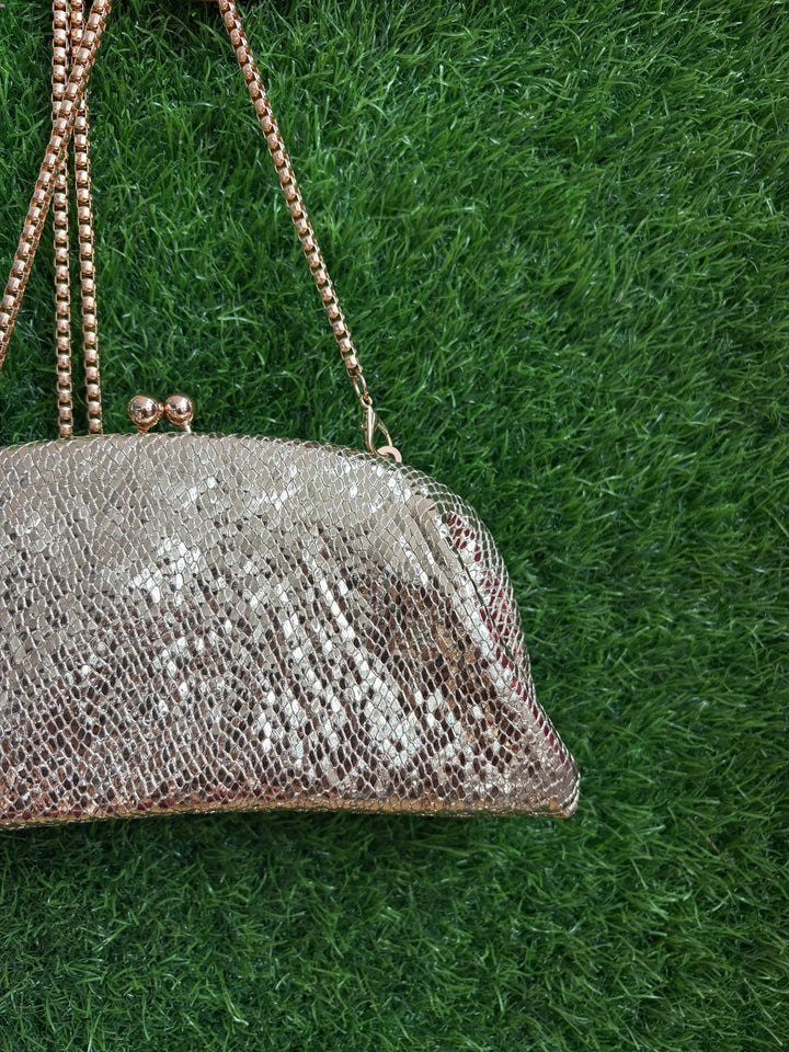 Textured Half-Frame Clutch in red, silver and golden colour options