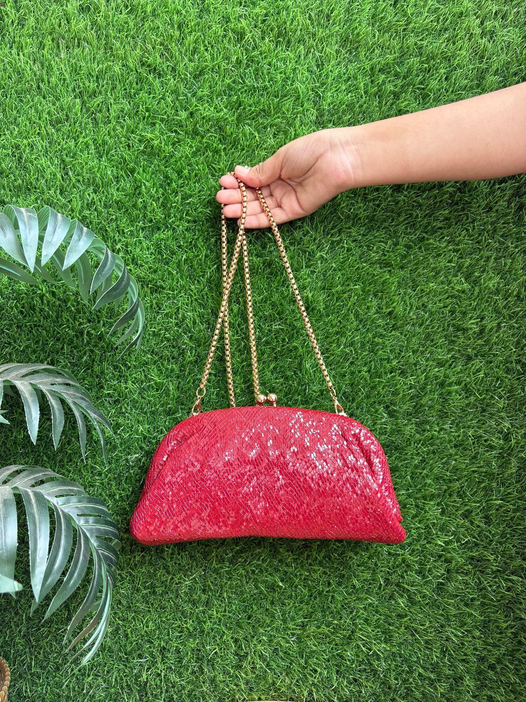 Women's ethnic party clutch bag in golden with textured finish