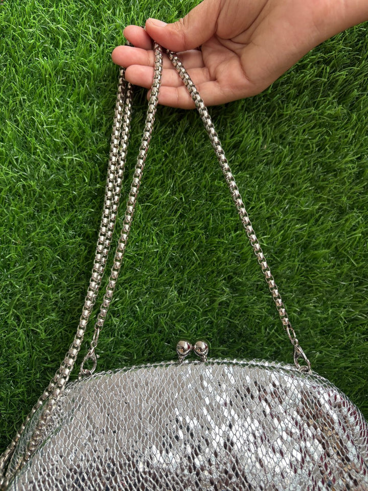 Silver Textured Half-Frame Clutch with detachable metal sling chain