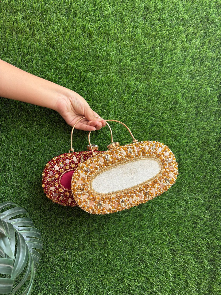 The Golden Jewelled Clutch gold embellished frame clutch