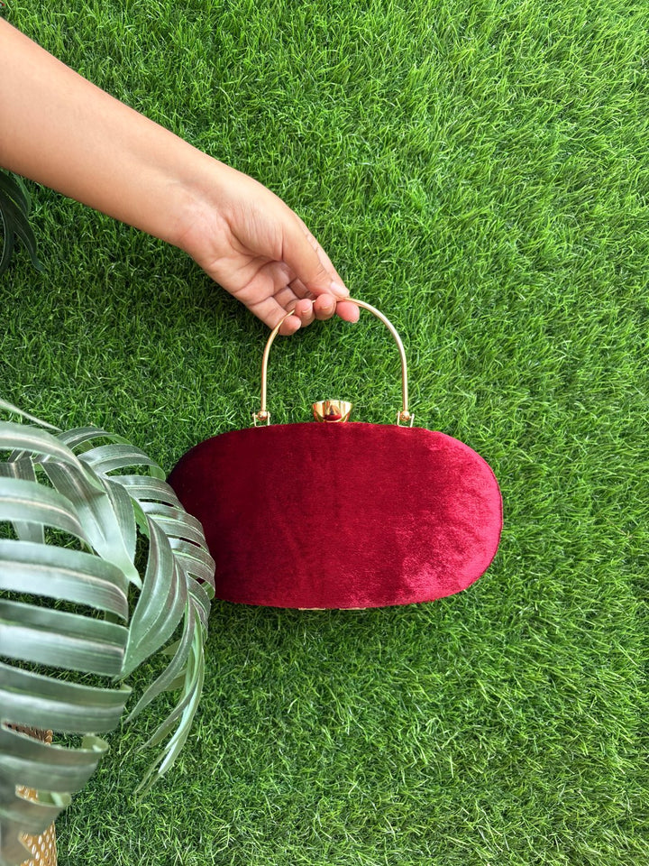 The Maroon Jewelled Clutch gold embellished frame clutch - back side detailing