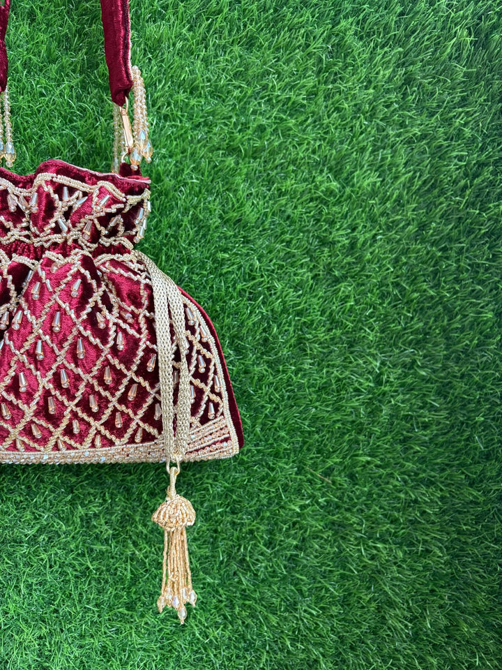 Traditional velvet potli purse for wedding and festive outfits