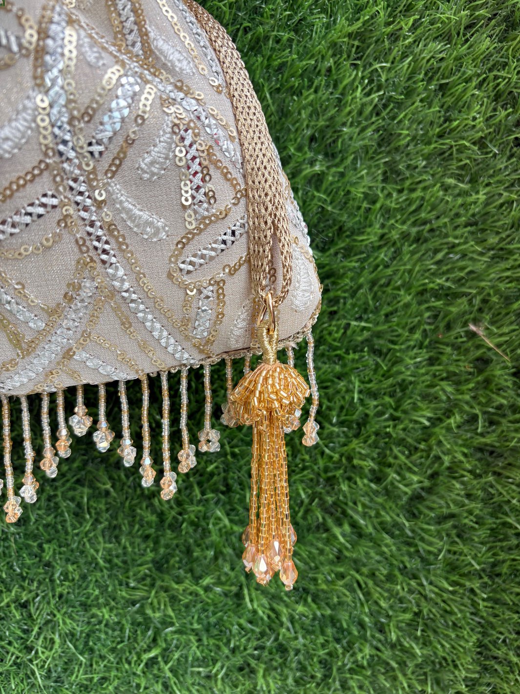 White Potli with Golden Braided Handle