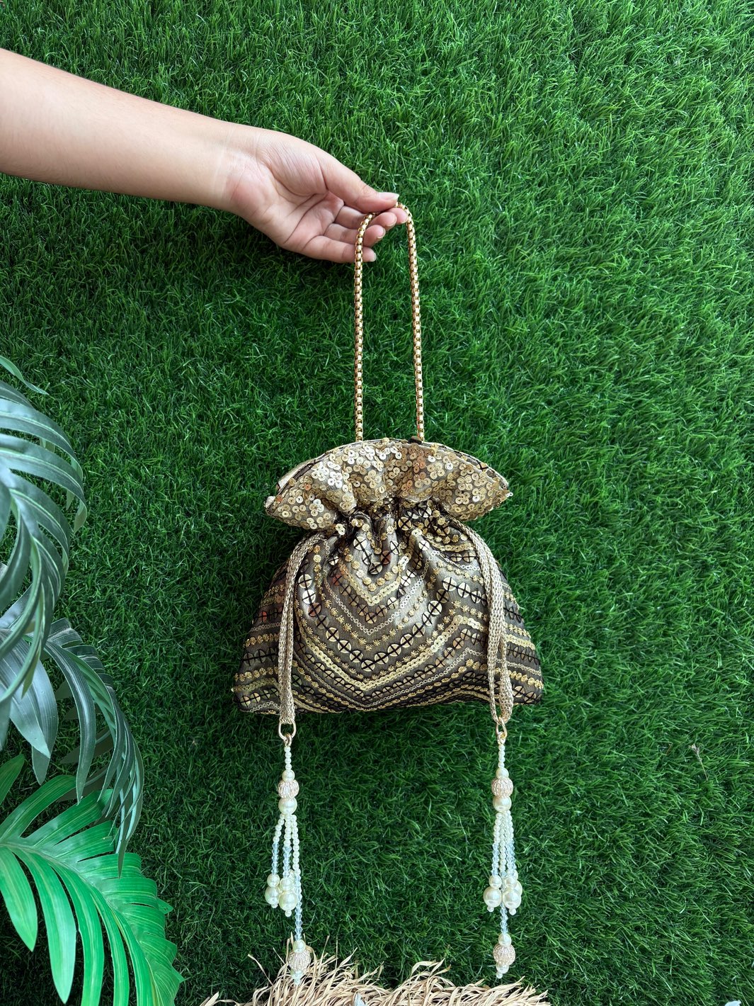 Black Artwork Potli handcrafted ethnic bag for weddings and festive occasions