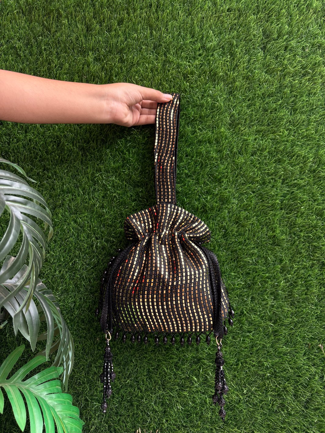 Handcrafted detailing on Black Dark Shine Potli by The Potli Ghar