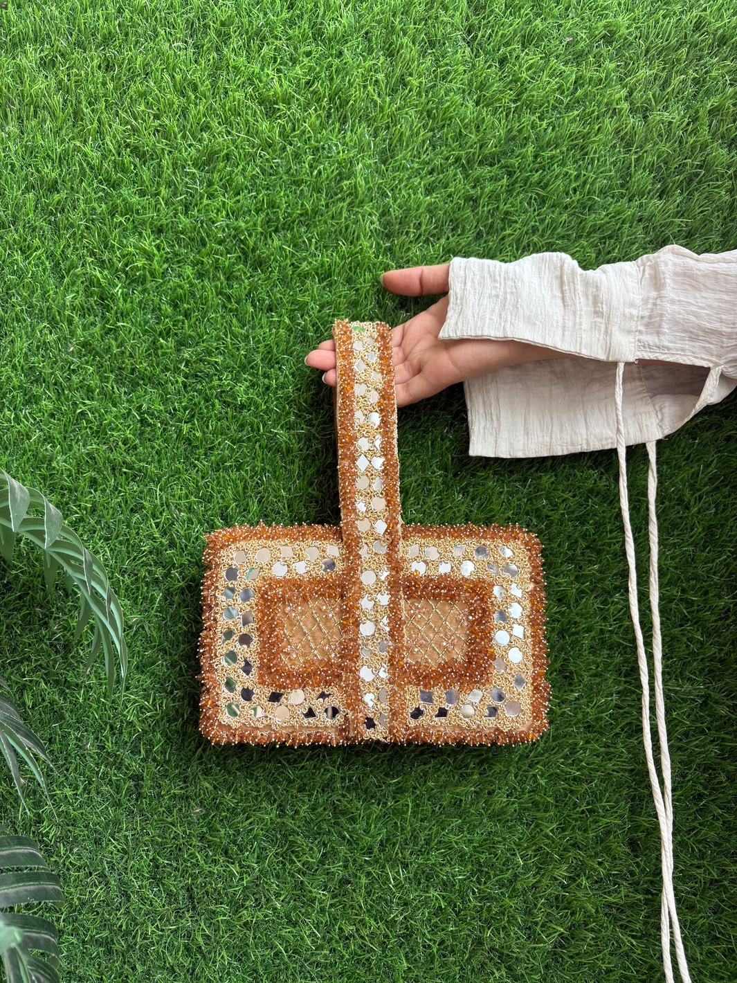 The Leela Edit luxury clutch